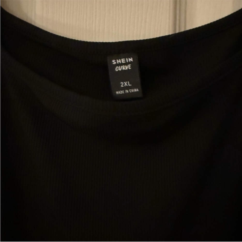 Black Ribbed Bodycon dress with Sheer Polka Dot Sleeves - Picture 6 of 8